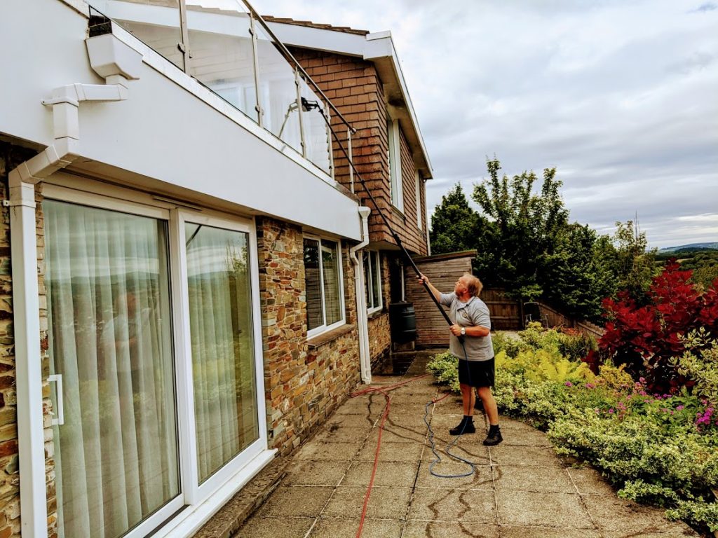 Mark at Bee Bright Window Cleaners Newton Abbot Cleaning with a Water Fed Pole